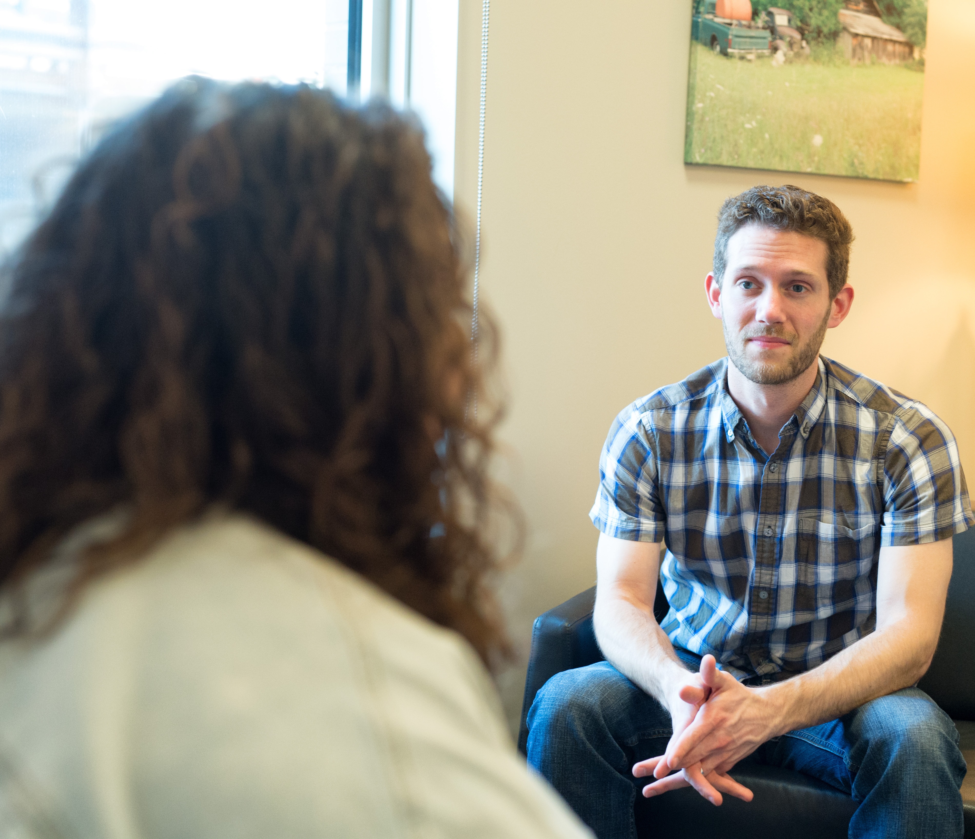 A counselor with a patient